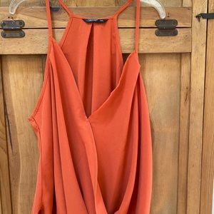 One orange and one black plus size tank-New